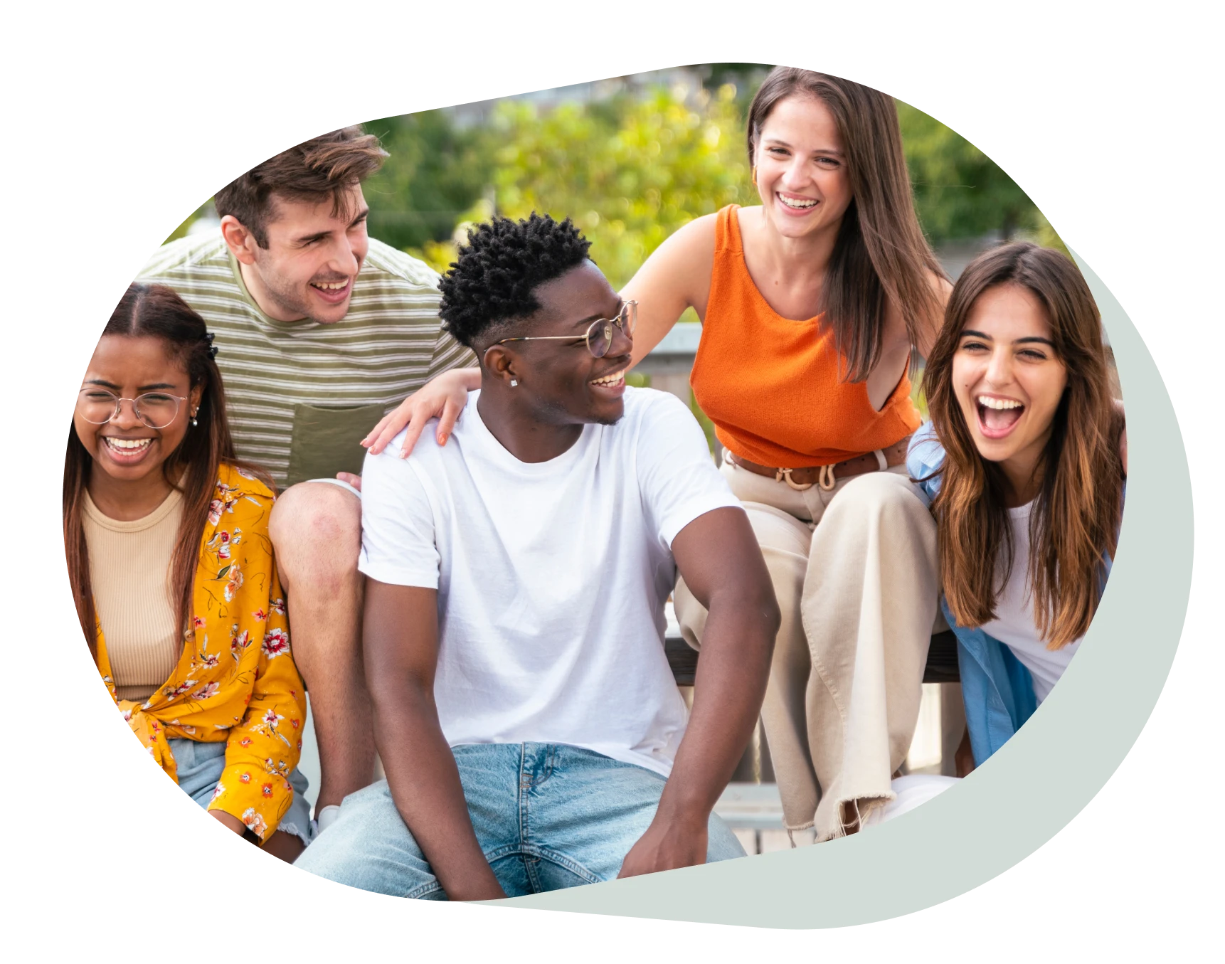 Group of five cheerful multiracial friends
